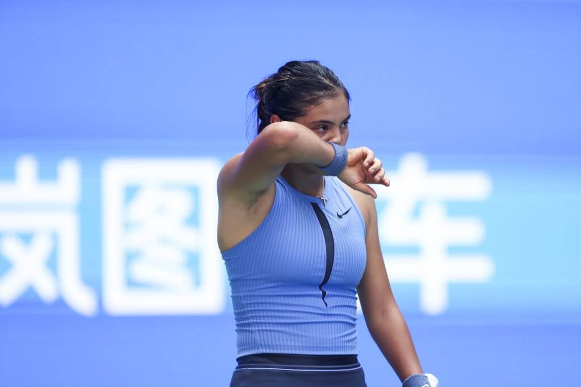Tennis player Emma Raducanu looks on at Wuhan Open in China