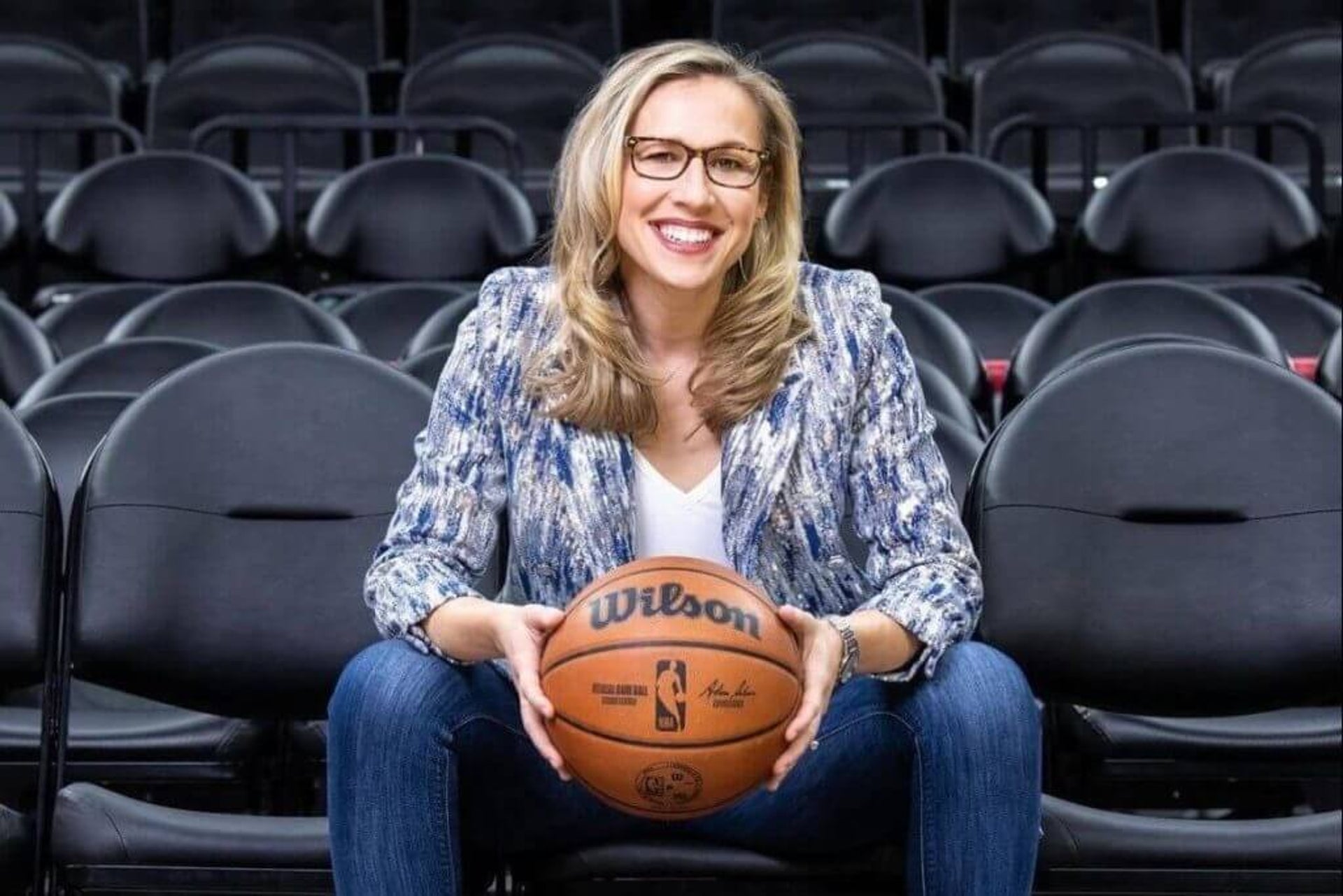 Kate Scott poses with a basketball.