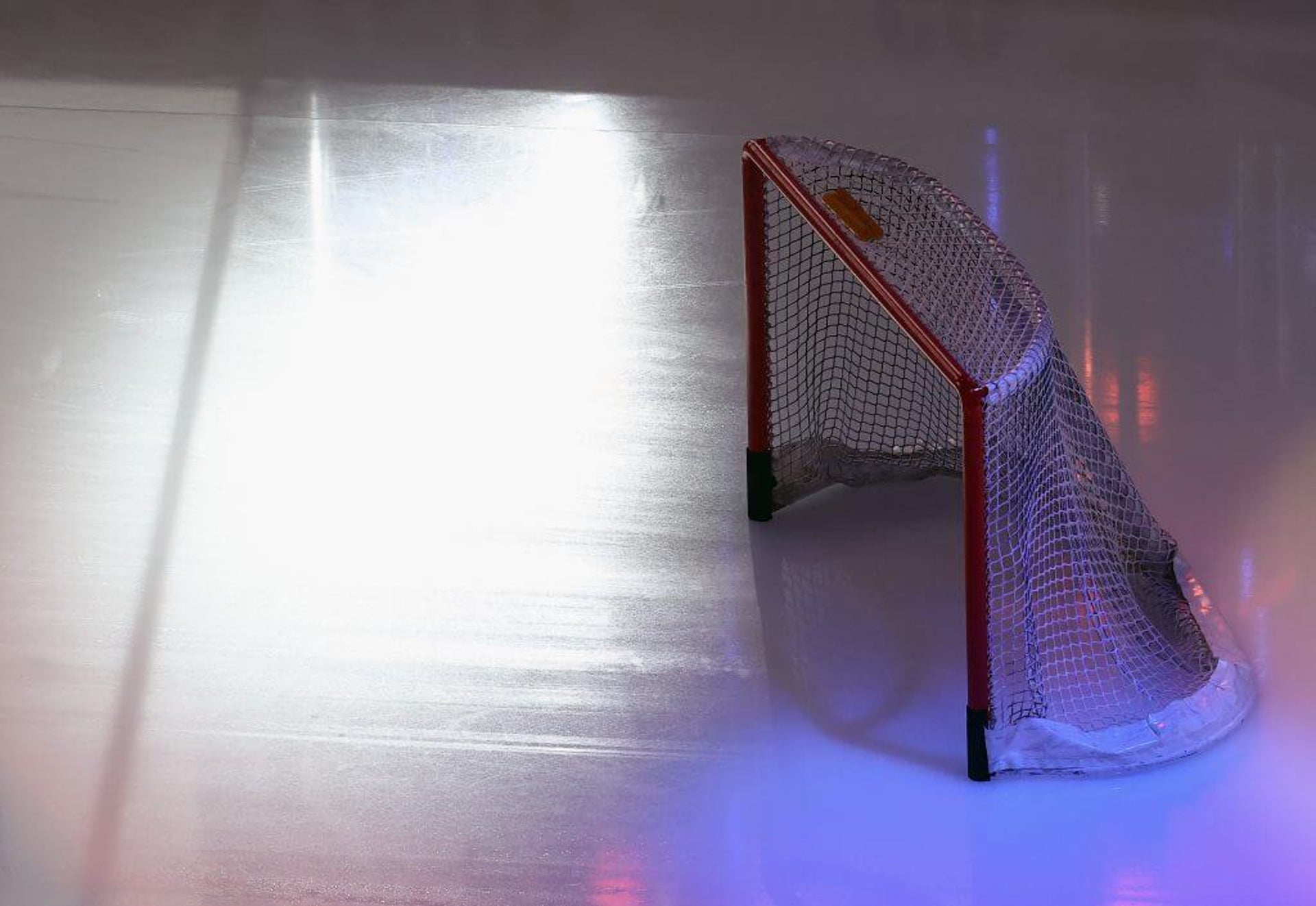 An empty hockey net sits on the ice at Rogers Place in Edmonton.