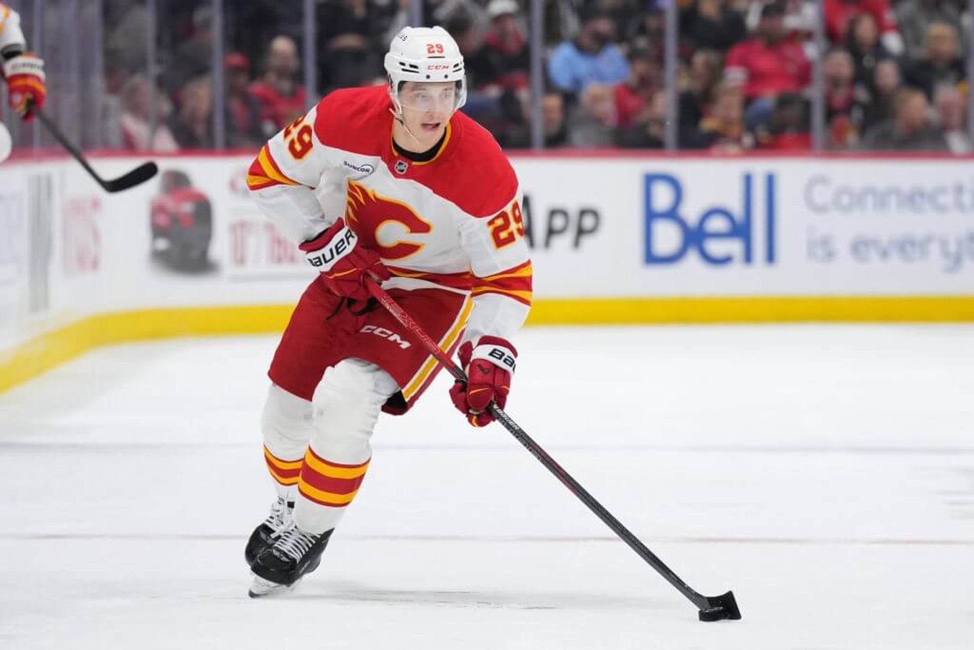 Calgary Flames forward Samuel Honzek skates during a game against the Ottawa Senators.
