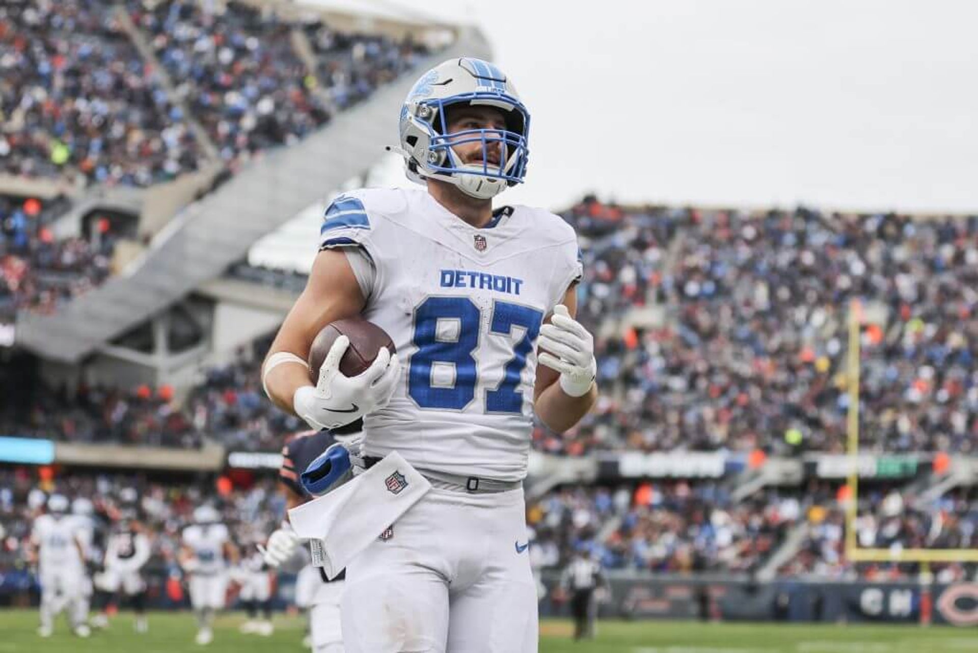 Sam LaPorta of the Detroit Lions celebrates after his touchdown reception against the Chicago Bears.