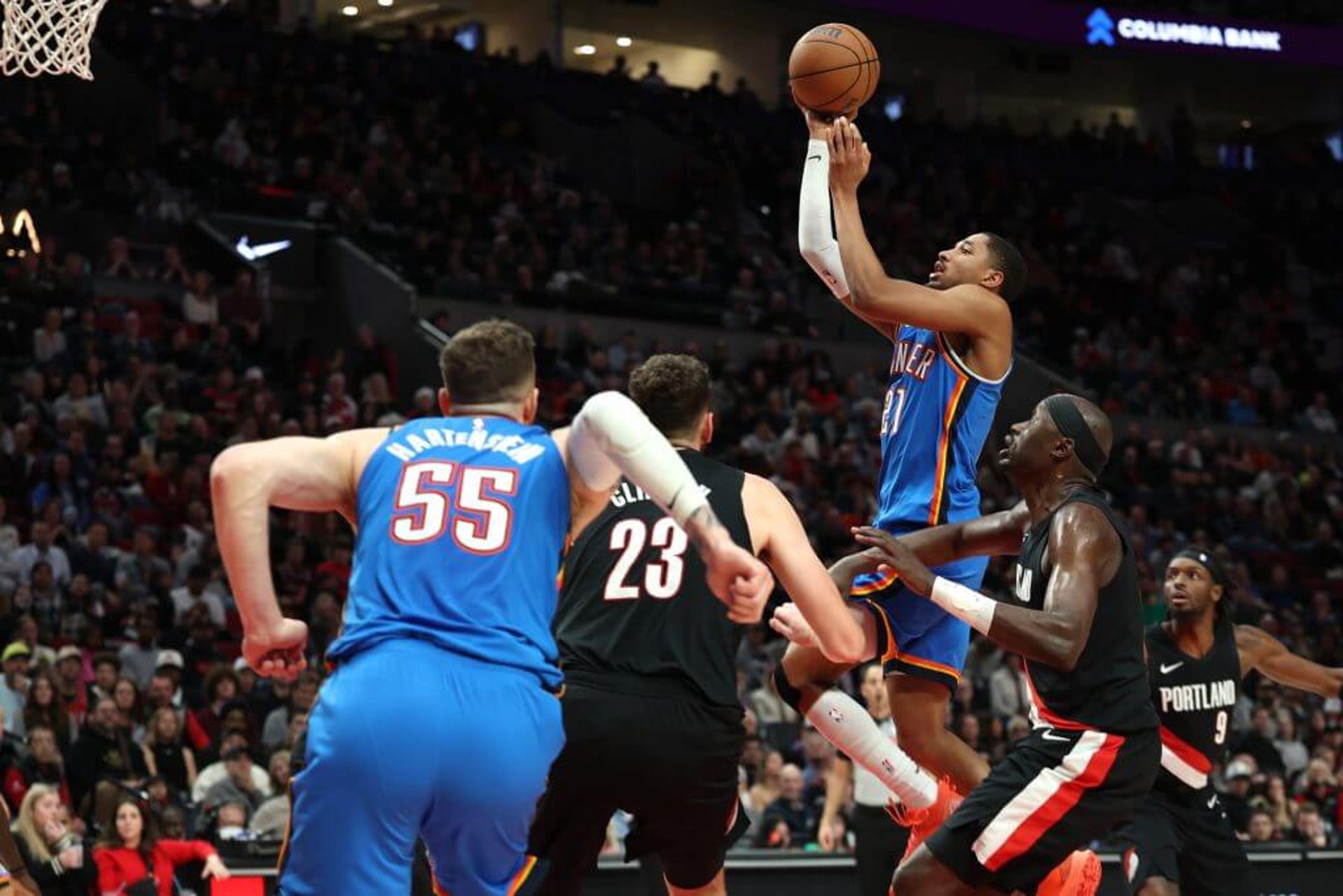 Thunder guard Aaron Wiggins shoots the ball against the Trail Blazers.