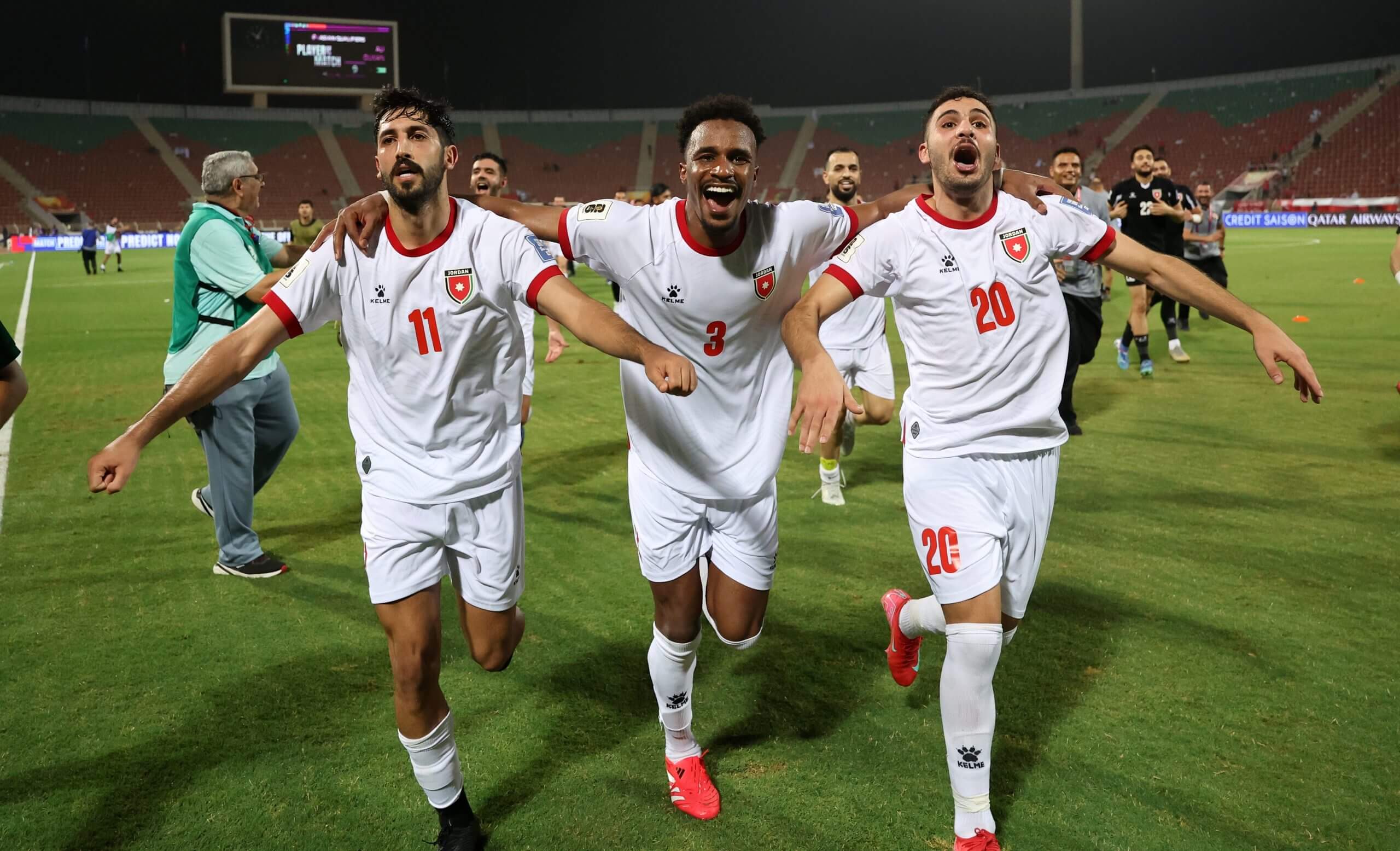 Jordan players celebrate qualifying for the World Cup