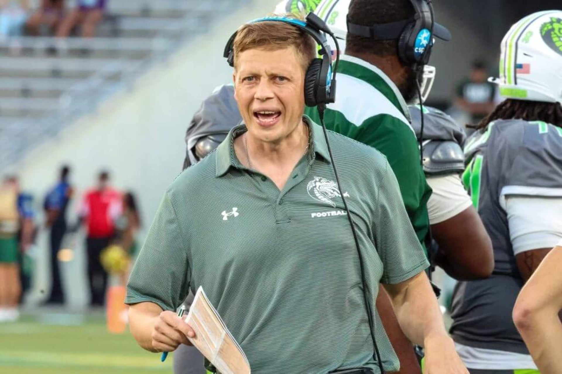 UAB coach Alex Mortensen walks the sidelines during a game against Memphis.