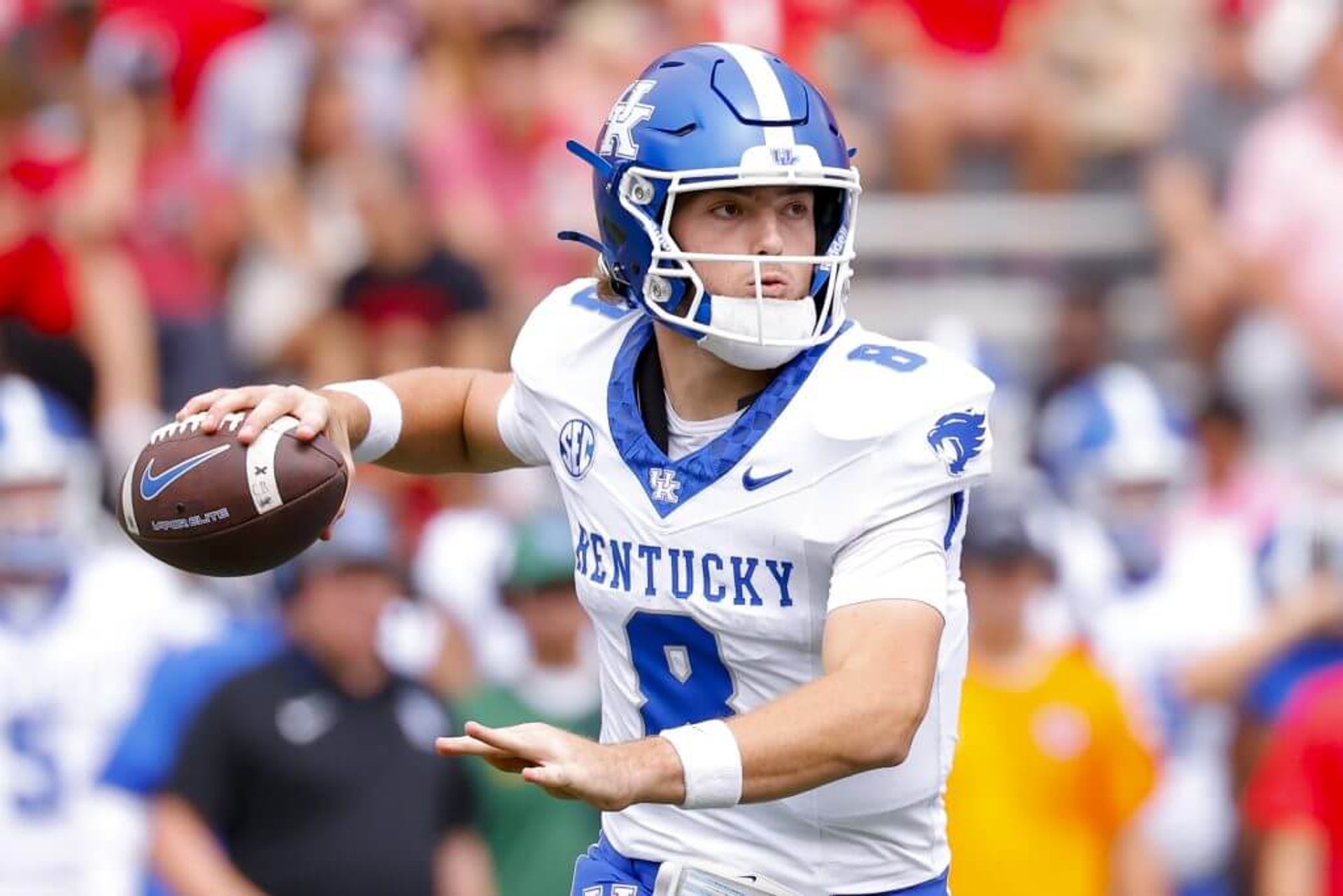 Kentucky quarterback Cutter Boley rolls out for a pass during a game against Georgia on Oct. 4, 2025.