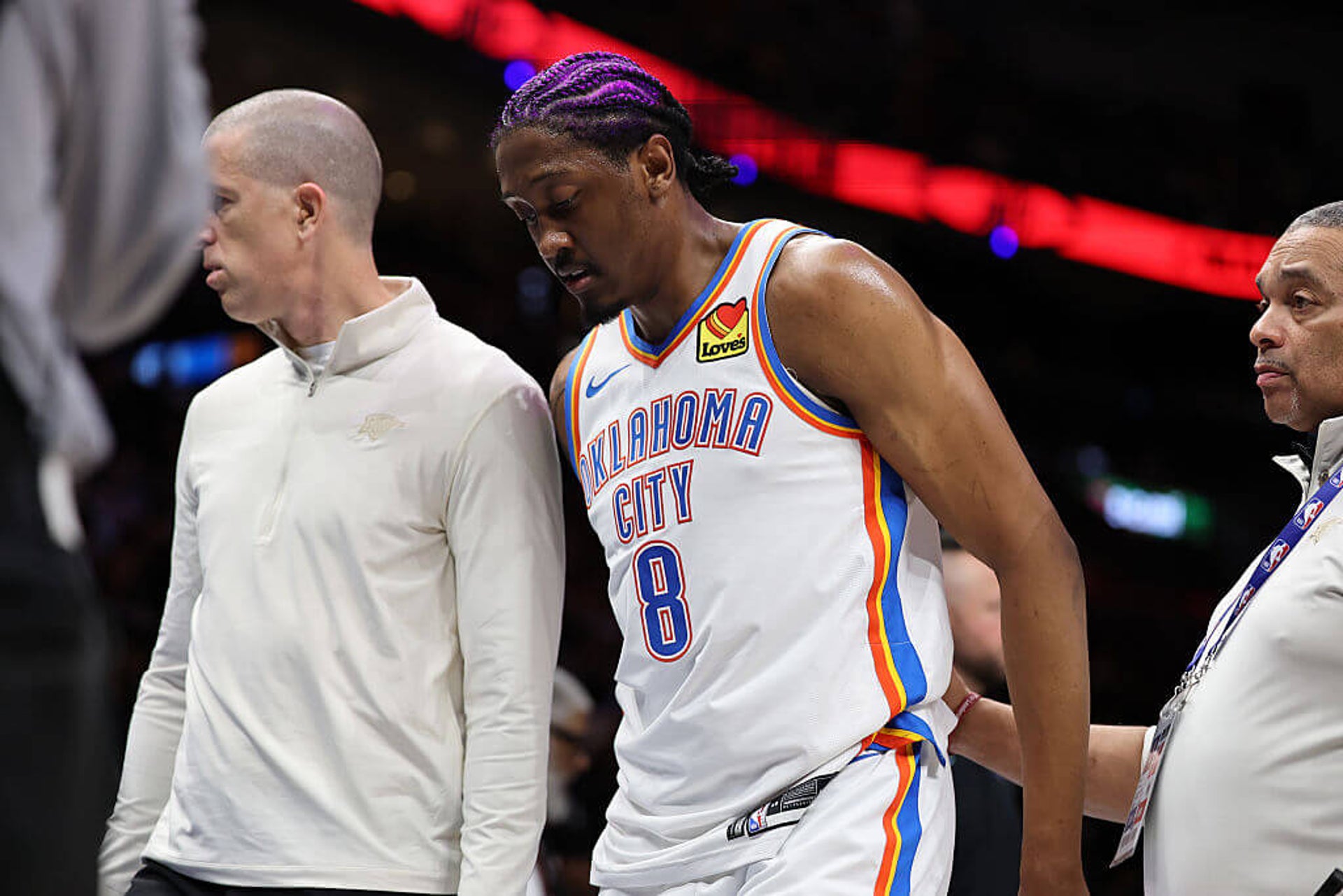 Jalen Williams is helped off the court during a Thunder-Heat game.
