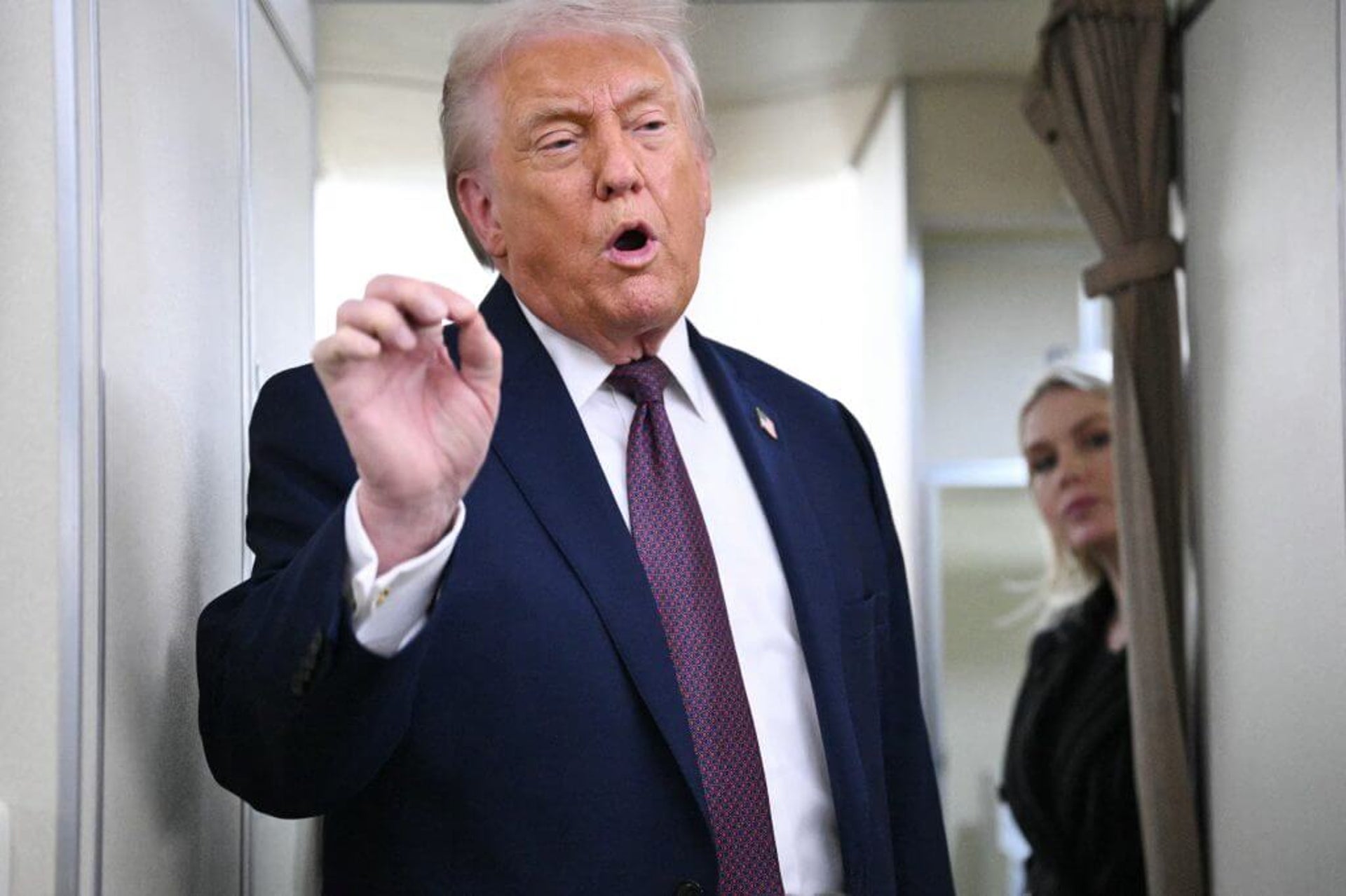 Trump speaks on Air Force One.